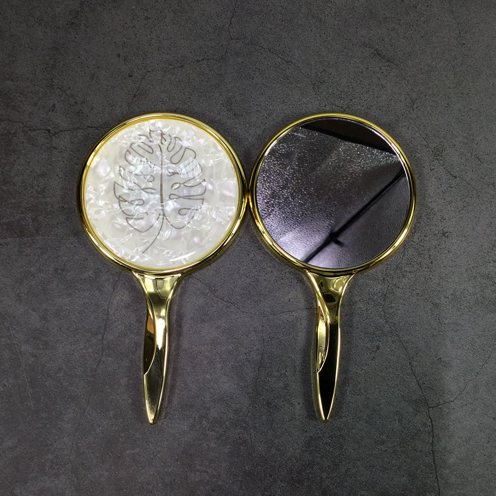 Miroir à poignée à motif de feuilles Miroir à main rond portable